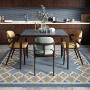 Nordis handwoven flatweave wool rug featuring a Scandinavian geometric border in blue, mustard, beige, and ivory, handmade for modern living rooms, bedrooms, and Nordic interiors.
