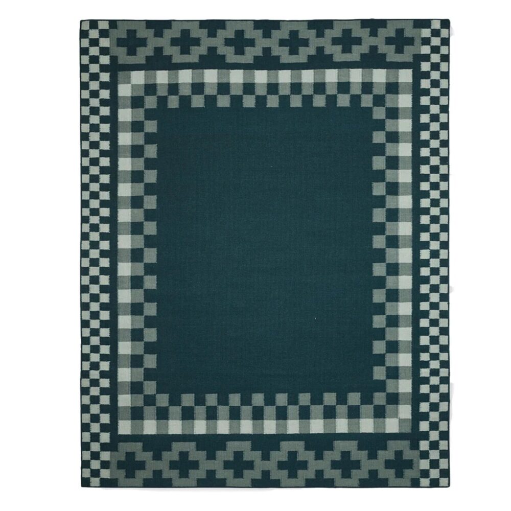 Aster Handwoven Flatweave Wool Rug featuring a Scandinavian geometric border in deep blue, grey, and ivory.