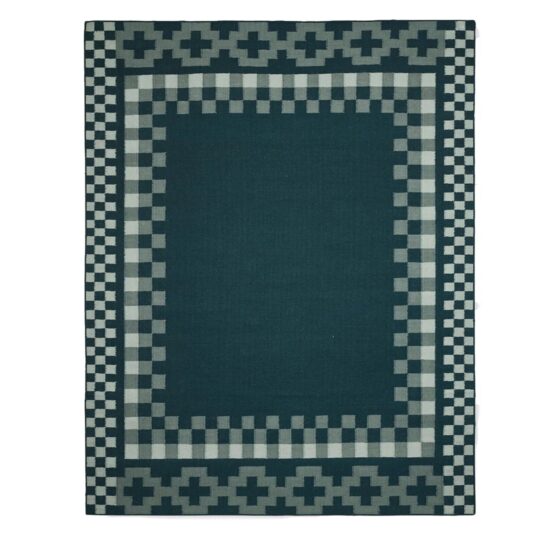 Aster Handwoven Flatweave Wool Rug featuring a Scandinavian geometric border in deep blue, grey, and ivory.