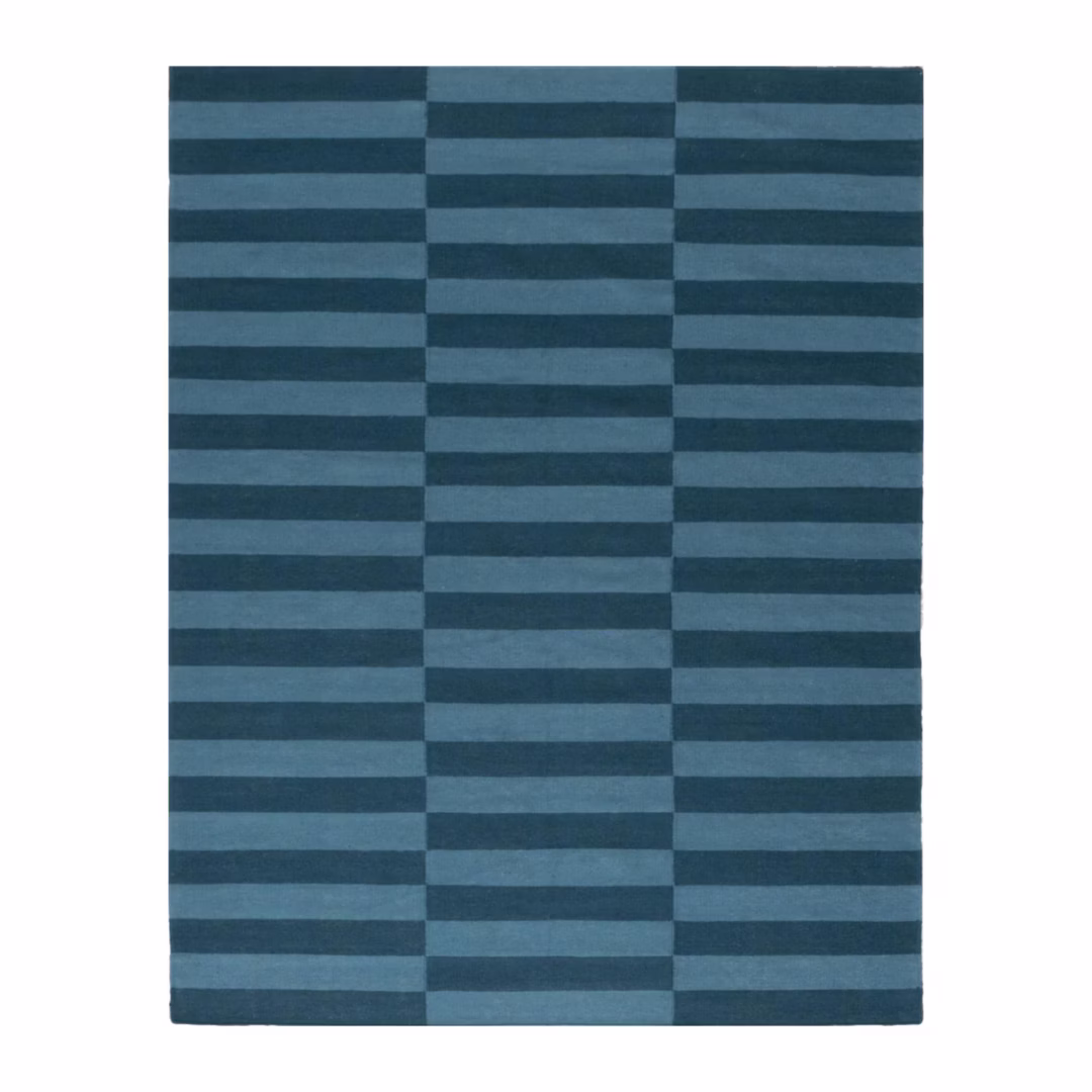 Azurea Handwoven Flatweave Wool Rug featuring modern blue horizontal stripes, handcrafted from premium Afghan wool for Scandinavian and minimalist interiors.