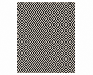 Kairo handwoven flatweave wool rug featuring a black and ivory diamond geometric pattern, handcrafted from premium Afghan wool for Scandinavian and modern interiors.